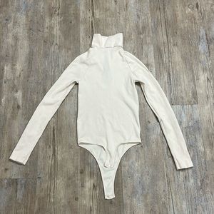 Free people light pink bodysuit turtleneck